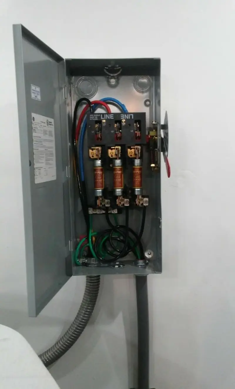 Three-phase disconnect switch installed for Smoke Detector Installation in Comstock